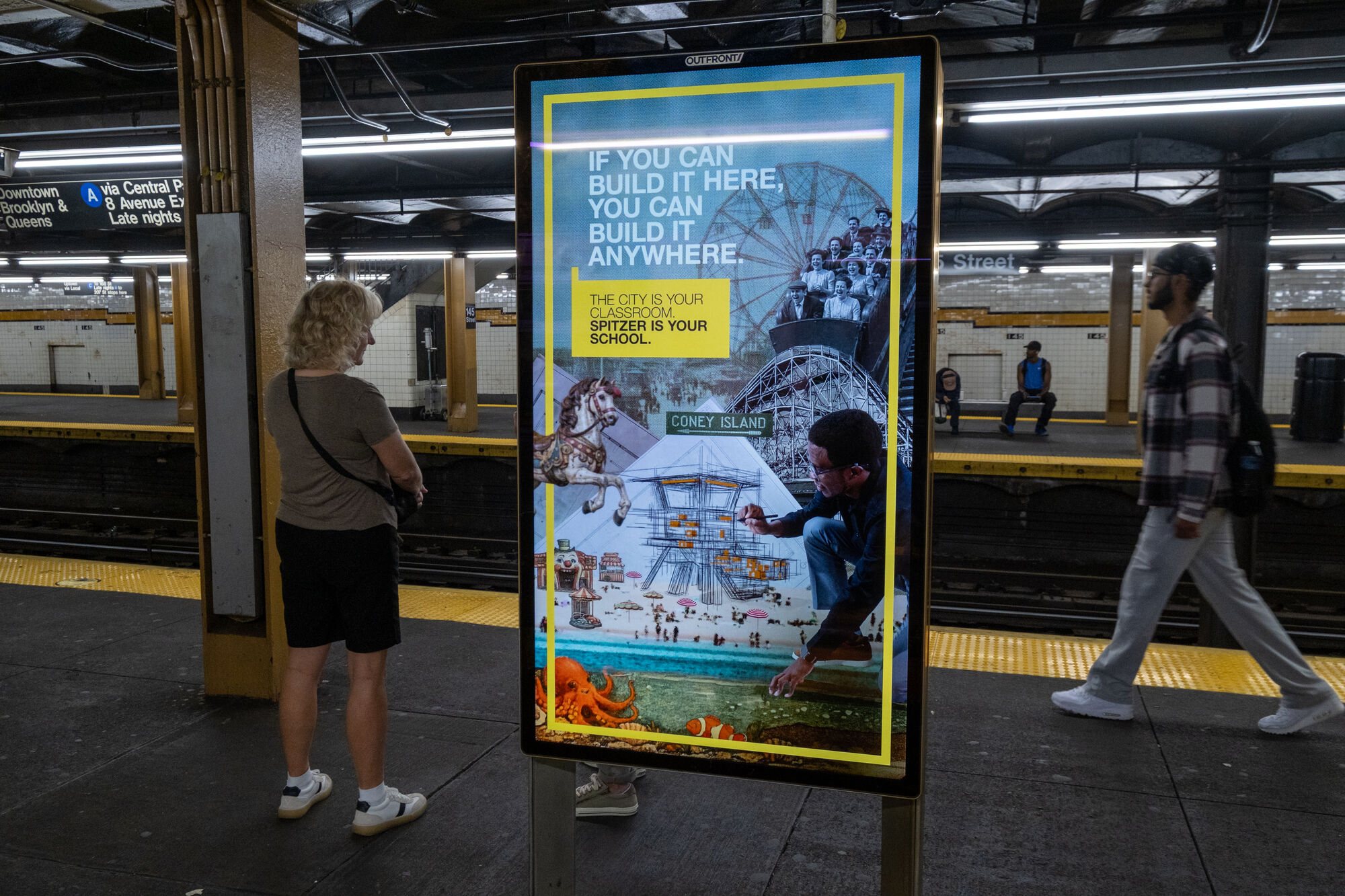 Spitzer campaign poster on a digital screen in a New York subway station